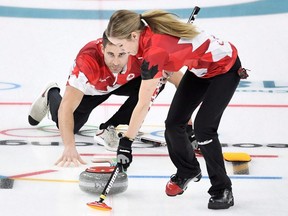 Canada's Kaitlyn Lawes and teammate John Morris