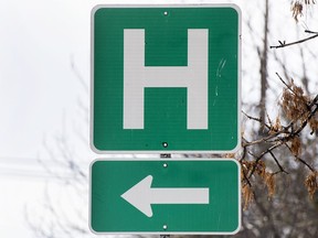 A sign for a hospital is shown in Montreal, Sunday, Feb. 6, 2022.