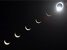 FILE - The progression of a total solar eclipse is seen in a multiple exposure photograph taken in 5-minute intervals, with the moon passing in front of the sun above Siem Reap in northwestern Cambodia, 225 kilometers (140 miles) from Phnom Penh, on Tuesday, Oct. 24, 1995.