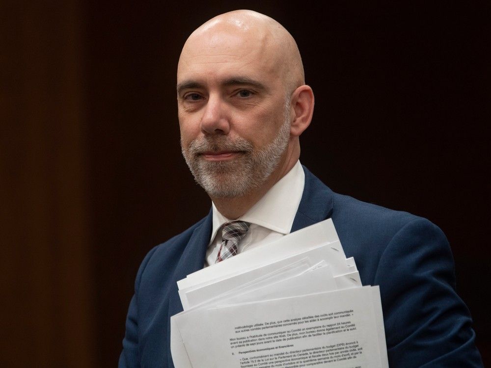Parliamentary Budget Officer Yves Giroux waits to appear before the Commons Finance committee on Parliament Hill in Ottawa, Tuesday March 10, 2020.