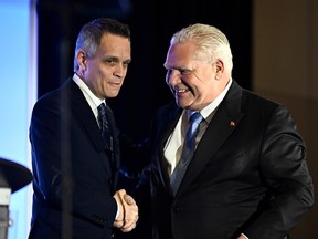 Doug Ford shakes hands with Mark Sutcliffe