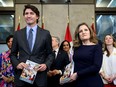 Prime Minister Justin Trudeau, Deputy Prime Minister, Minister of Finance Chrystia Freeland and cabinet ministers pose for a photo before the tabling of the federal budget on Parliament Hill in Ottawa, on Tuesday, April 16, 2024.