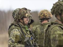 Woman in combat fatigues