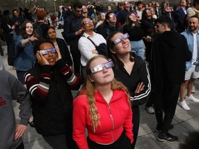 Students and staff attended a solar eclipse viewing party at Carleton University in Ottawa, April 8, 2024.