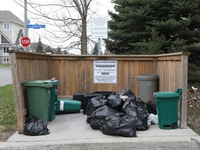 Westover: City needs to crack down on open trash containers