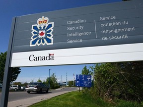 A sign for the Canadian Security Intelligence Service building is shown in Ottawa in 2013.