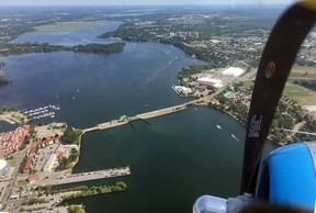 A view of the LaSalle Causeway and the Cataraqui River from the nose-gunner's position within a vintage B25 bomber being hosted by the Kingston Flying Club at Norman Rogers Airport in Kingston, Ont. on Monday July 30, 2018. The 1944 "Maid in the Shade" is on the North American Flying Legends of Victory Tour this summer with The Airbase Arizona Commemorative Air Force Museum. Steph Crosier/The Whig-Standard/Postmedia Network