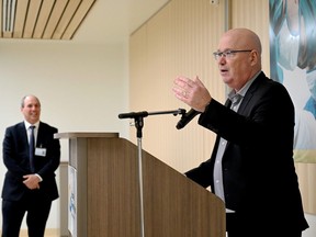 Leeds-Grenville-Thousand Islands and Rideau Lakes MPP Steve Clark, right, speaks at a media event at Brockville General Hospital while the hospital's president and CEO, Nick Vlacholias, listens