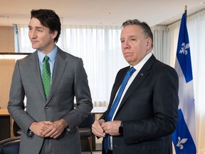 Prime Minister Justin Trudeau, left, attends a bilateral meeting with Quebec Premier François Legault in Montreal on Friday, March 15, 2024.