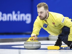 Sweden's Rasmus Wranaa delivers a stone against Japan at the World men's Curling Championship, at the IWC Arena in Schaffhausen, Switzerland on Sunday March 31, 2024.