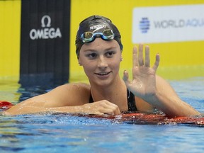 Summer McIntosh of Canada celebrates after winning the women's 400m medley final at the World Swimming Championships in Fukuoka, Japan, Sunday, July 30, 2023.