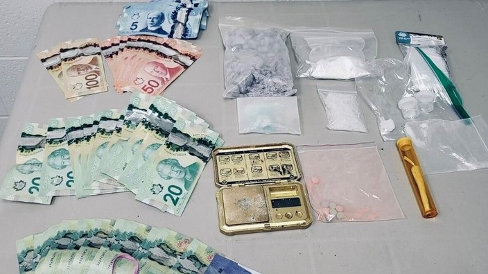 Burned-out headlight leads OPP to drug stash, $5,000 in cash