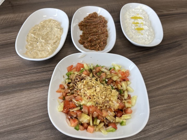  Assorted dips (left to right, baba ghanoush, ezme and cacik), above mountain salad, at the Turkish Anatolia restaurant