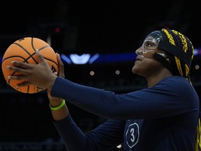 UConn's Aaliyah Edwards gets set to shoot during a practice for an NCAA Women's Final Four semifinals basketball game Thursday, April 4, 2024, in Cleveland. The Kingston native is a projected first-round pick for Monday's WNBA draft after a successful four-year career with the Huskies.