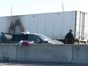 OPP officers investigate a collision on Highway 401 just east of Prescott on Tuesday, Nov 28, 2017.
