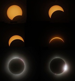 Families and friends take in the eclipse at Crysler's Farm outside Cornwall Monday.