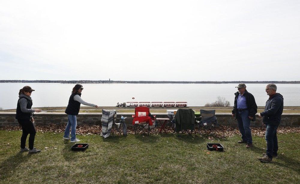 Christine Simonot , Virginia McLeod, Raymond Simonot and Terry Willougby were the first to arrive to the eclipse viewing area at Chrysler's Farm Monday morning.