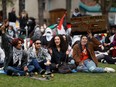 uOttawa's Palestinian Students Association held a sit-in in front of Tabaret Hall on Monday to demand the school cut ties to defence and security companies that supply weapons to Israel.