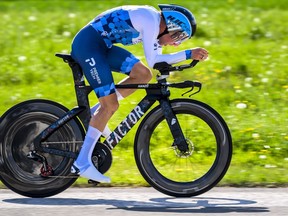 Michael Woods from Canada competes in the prologue, a 5,12 km race against the clock at the 75th Tour de Romandie UCI ProTour cycling race in Lausanne, Switzerland, Tuesday, April 26, 2022. Woods is headed to his third Giro d'Italia and 11th Grand Tour race.