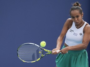 Leylah Fernandez returns a ball from Jessica Pegula in their women's third round match at the Miami Open tennis tournament, Sunday, March 24, 2024, in Miami Gardens, Fla. Fernandez was eliminated from the Charleston Open tennis tournament following a 6-4, 6-4 loss to American Sloane Stephens on Thursday.