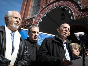 “When (the Bagg Street Synagogue) was attacked, the Jewish community as a whole felt attacked,” said Marvin Rotrand, right, director general of United Against Hate Canada. Rotrand spoke in front of the synagogue on Tuesday, April 4, 2023 alongside others including Henry Topas, left, Quebec regional director of B'nai Brith Canada, and synagogue board member Sam Sheraton, centre.