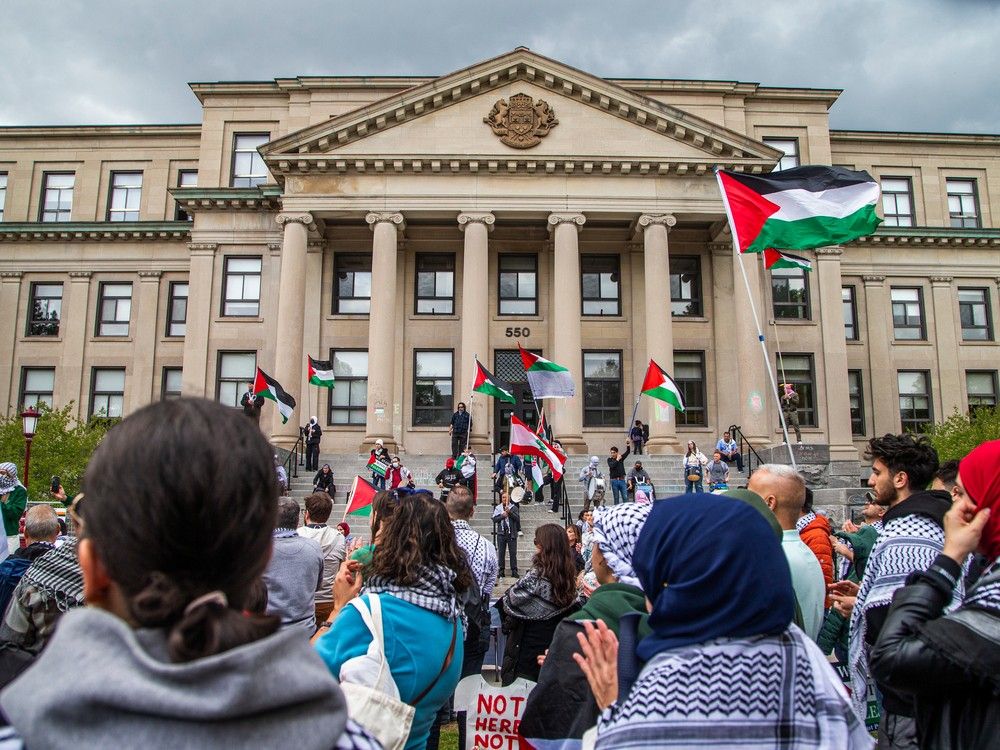 Protesters have occupied a portion of the lawn in front of Tabaret Hall on the University of Ottawa campus to protest the ongoing conflict in Gaza.
