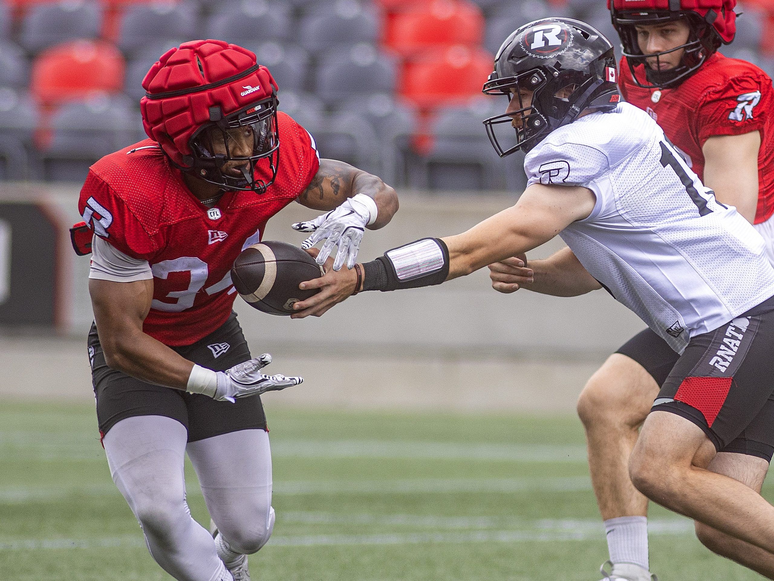 Ottawa Redblacks running back Amlicar Polk takes a handoff.
