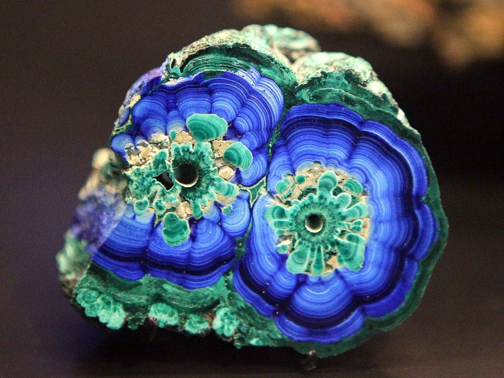  The Earth Gallery exhibit, which shows the cycle of rocks and minerals on earth features over a thousand rocks, minerals and gems, a limestone cave and cool simulators of earthquakes and volcanoes. Here, closeup of Azurite and malachite.  Julie Oliver, Postmedia