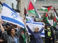 Pro-Palestinian demonstrators and pro-Israeli supporters were both on the front lawn of Ottawa City Hall after the City raised an Israeli flag, May 14, 2024.