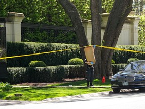 Toronto Police investigate a shooting outside the mansion of Canadian rap mogul Drake in Toronto's Bridle Path neighbourhood, Tuesday, May 7, 2024.