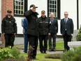 Princess Anne salutes after laying a commemorative wreath following a tour at the God's Acre cemetery at Esquimalt, B.C., on Saturday, May 4, 2024.