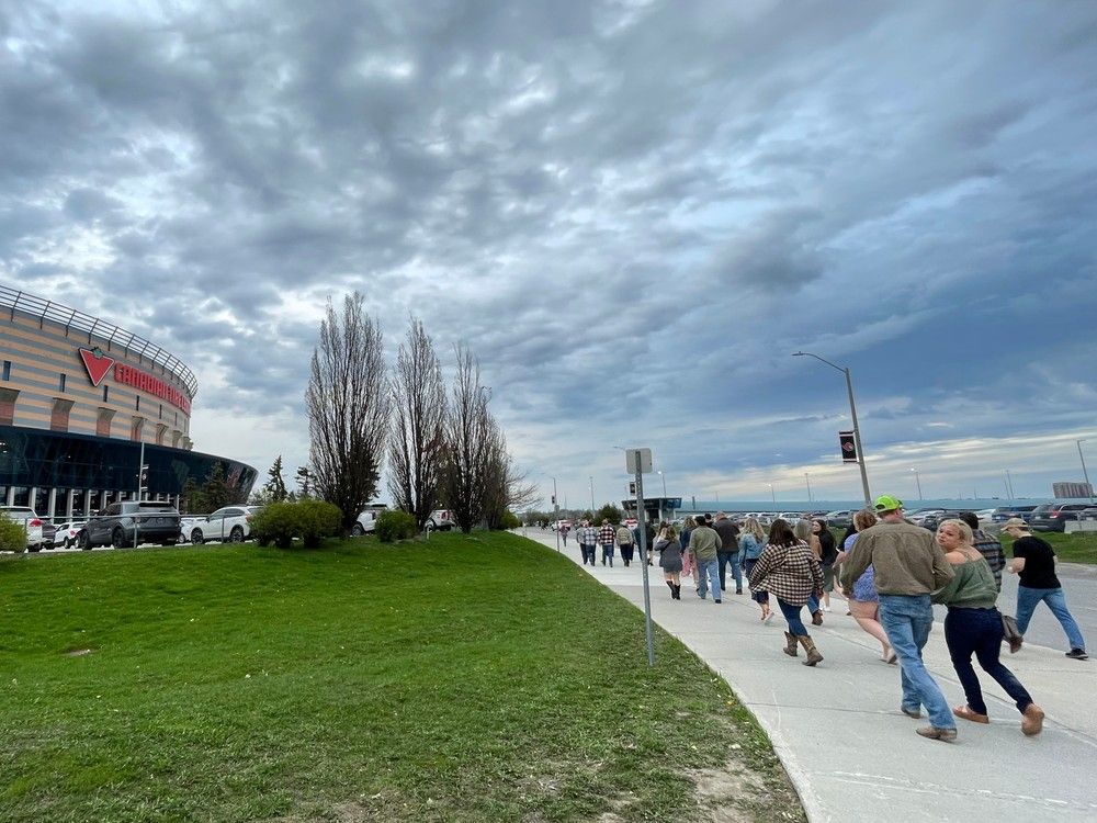 Fans make their way to Canadian Tire Centre for the Tim McGraw concert.