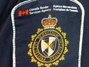 A file photo of a Canadian Border Services Agency officer's shoulder flash in Calgary.