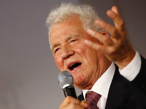 Frank Stronach speaks at a news conference in 2012. “He’s had an outsized voice in Canadian public affairs for a long time,” says one business school professor.