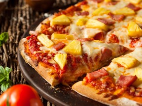 Hawaiian-style pizza with pineapple and ham.