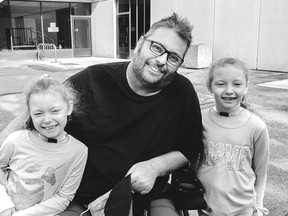 Sean Sisk outside the Rehab Centre with his twins