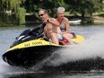 Andreas Reissmann and his partner, Dawn Martinson, beat the sweltering 31 C heat Wednesday by making waves on the Rideau Canal near Manotick.