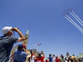 Deachman: I played a Canada Day treasure hunt of my own design. 20 Snowbirds above Parliament Hill.
