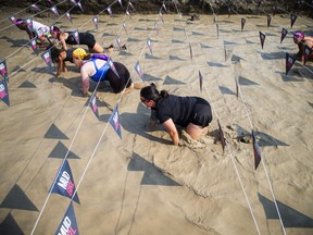 MUDGIRL brought their entry-level obstacle course 5K run to Wesley Clover Park.