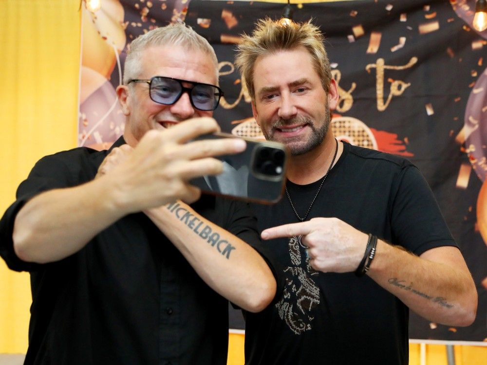 Tim Tierney (L) got to meet the Nickelback band and lead vocalist Chad Kroeger backstage at Bluesfest in Ottawa, July 05, 2024.