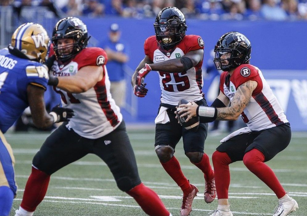 Ottawa Redblacks quarterback Dru Brown fakes a handoff to Ryquell Armstead during the first half against the Winnipeg Blue Bombers last week.