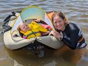 Anne Griffith plans to tow her 3 1/2-year-old daughter, Amelia, when she swims in the Bring on the Bay 3km open water swim for Easter Seals. Amelia is paralyzed from the chest down. Anne's husband, Casey Thomas, took the photo.