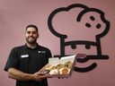 Andy Al Hasan, owner of Crumbl Cookie, poses for a photo at his busy store in Ottawa.