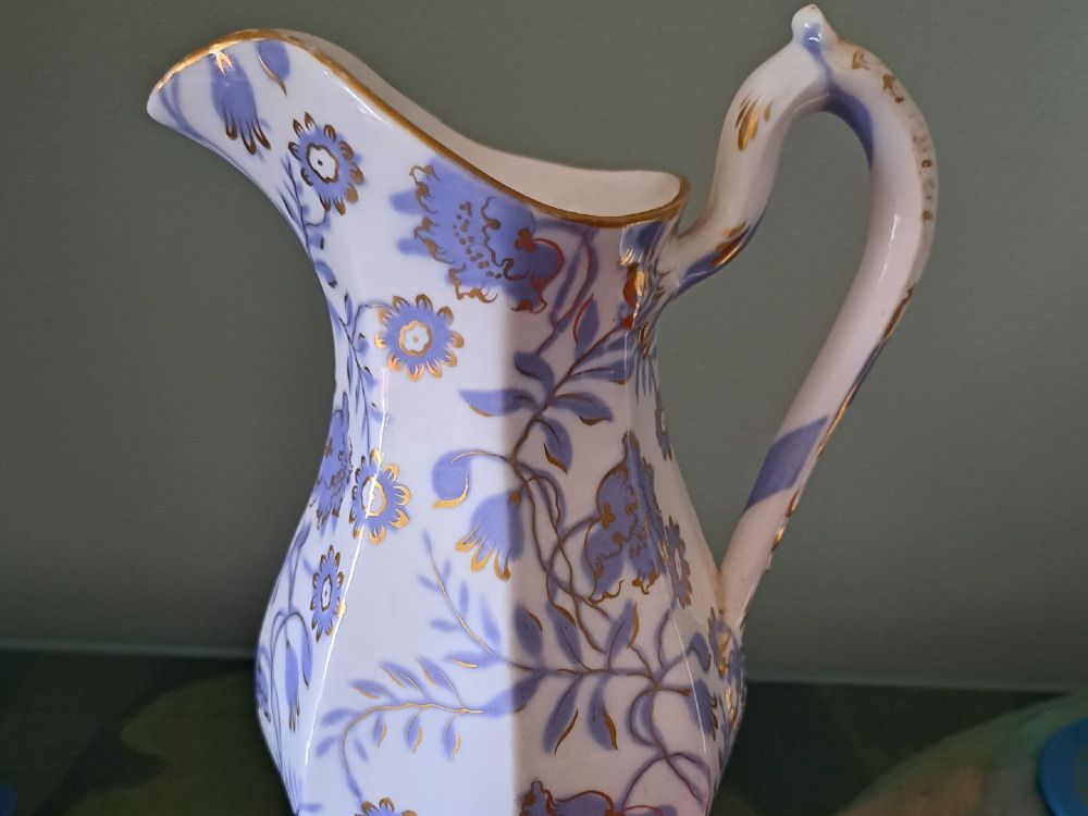 Antiques: Pitcher dances with lavender highlights 