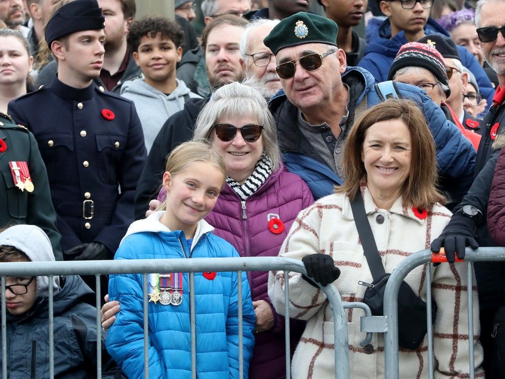 young girl in the crowd at remembrance day in ottawa