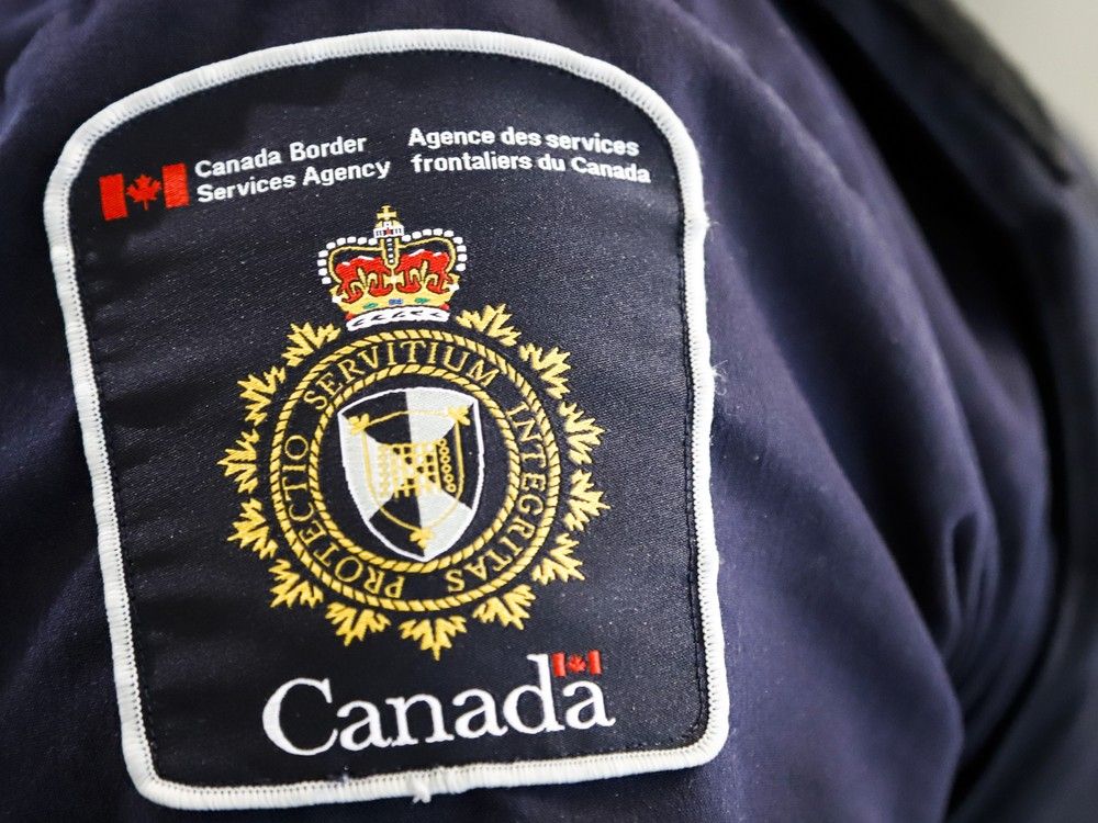 a canada border services agency patch is seen on an officer in this file photo.