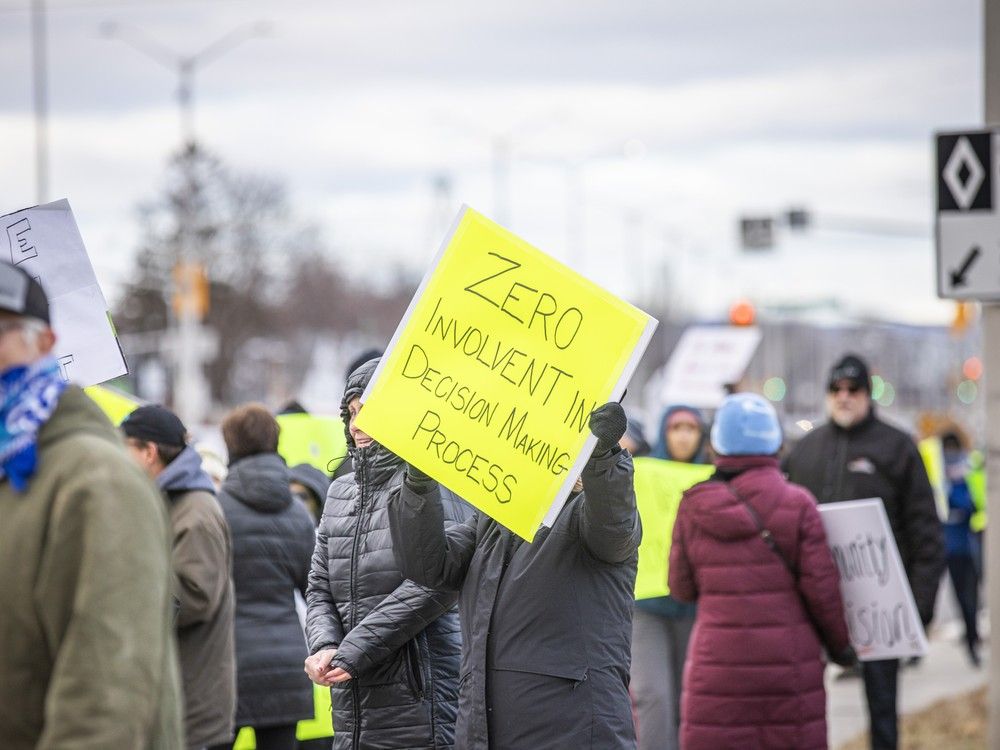 a group of close to a hundred area residents gathered to protest at the location of a proposed tent-like structure for temporary housing of asylum seekers at the nepean sportsplex in late november.