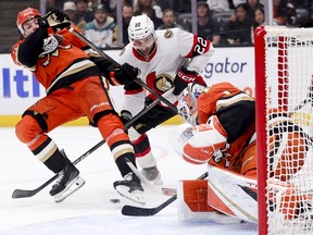 Michael Amadio of the Ottawa Senators battles in front of the Anaheim net during Sunday's 4-3 loss that ended in a shootout.