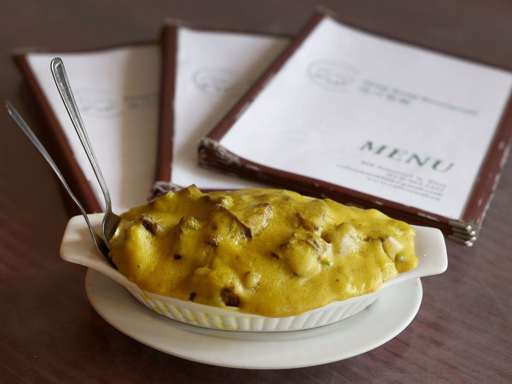  baked brisket with curry sauce on rice at cafe orient, a three-decades-old bastion on hong kong cuisine on somerset street west in ottawa.