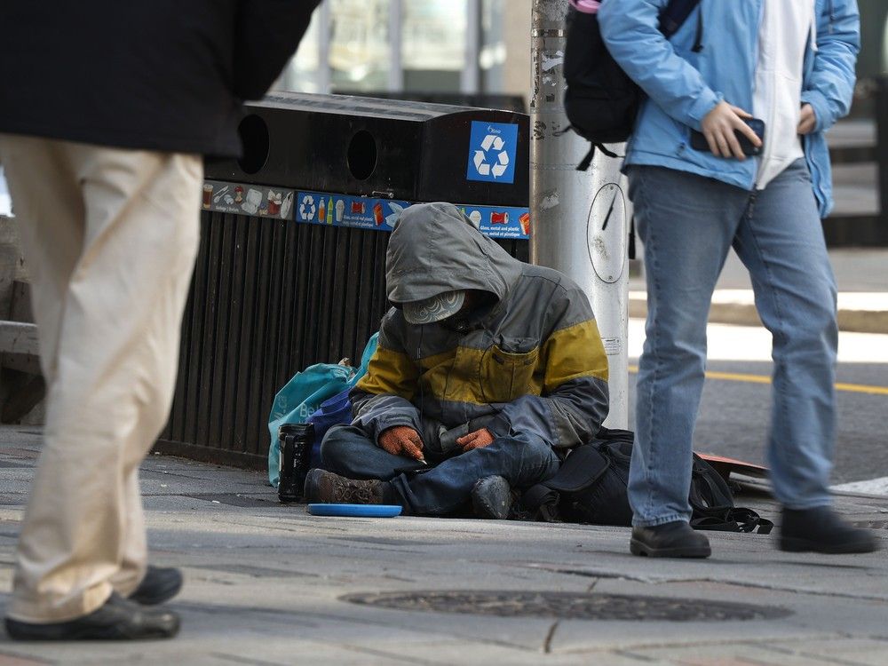 People forced to sleep in plastic chairs in overcrowded shelter system